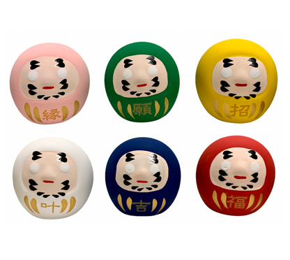Daruma doll with omikuji